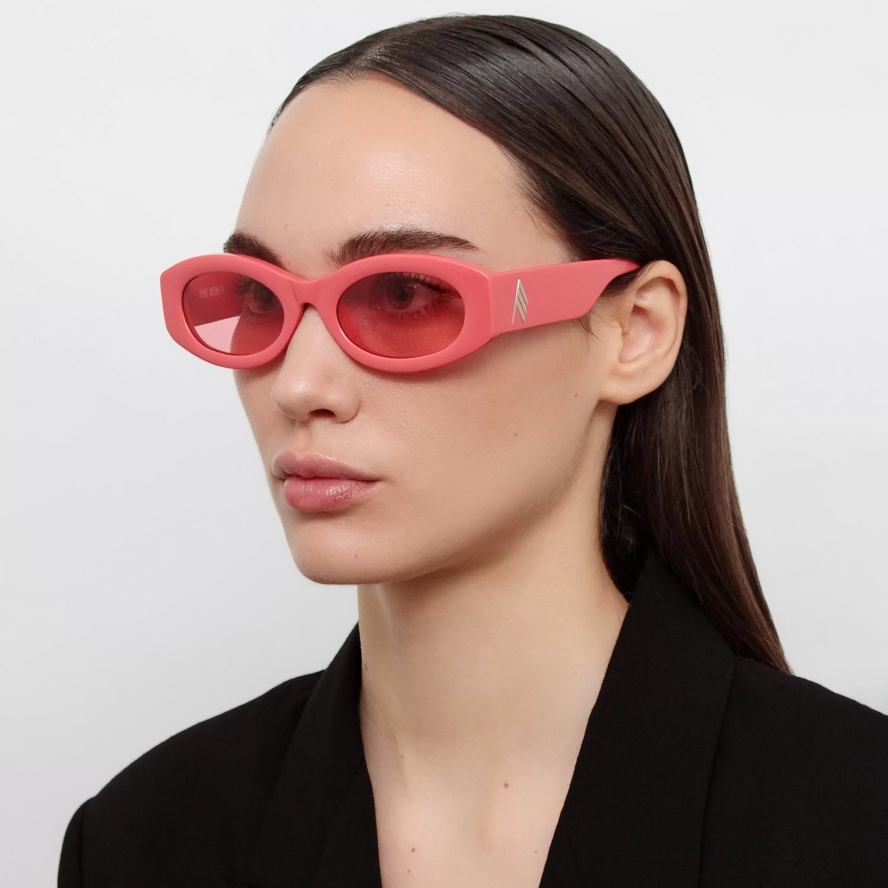 The Attico Berta Oval Sunglasses in Coral